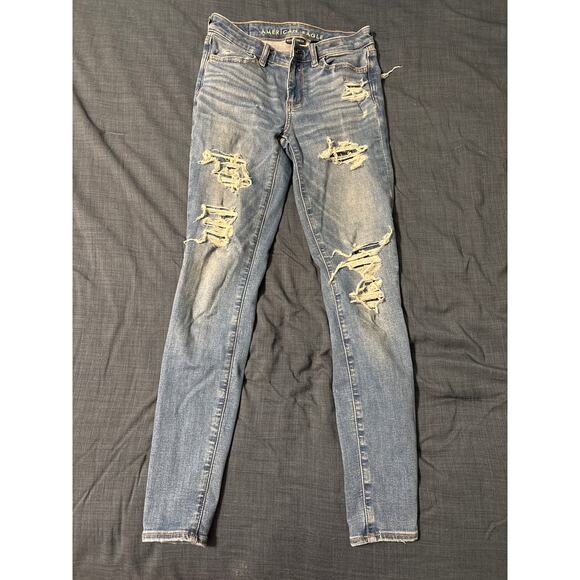 American Eagle Next Level Stretch Light Wash Distressed Skinny Jeans Size 0 - Picture 1 of 4